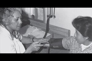 nurse treating patient