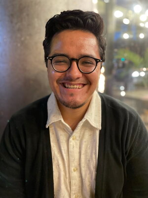 Image of Juan Mora smiling at the camera