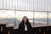 Kailey Reyes poses on top of the empire state building