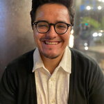 Image of Juan Mora smiling at the camera 